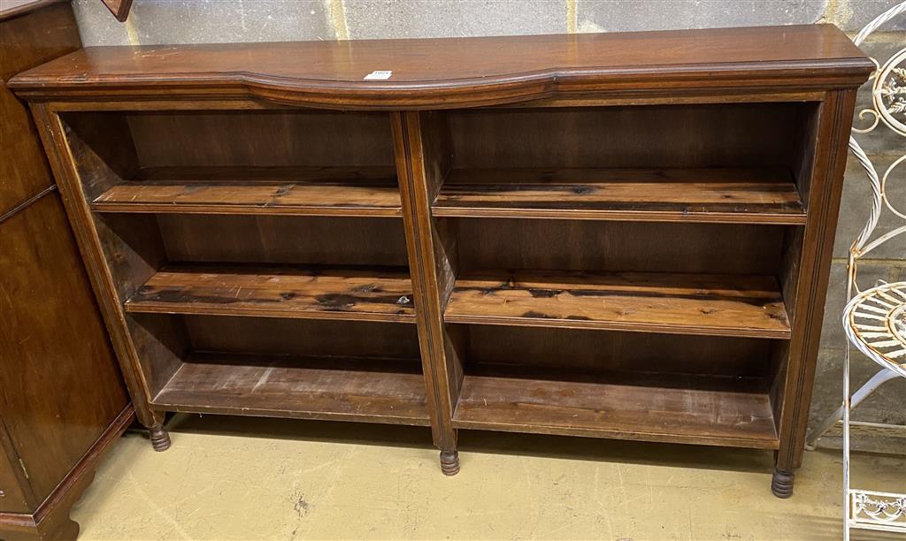 A Victorian mahogany open shelved bookcase, with bowfront centre section, length 150cm, height 94cm